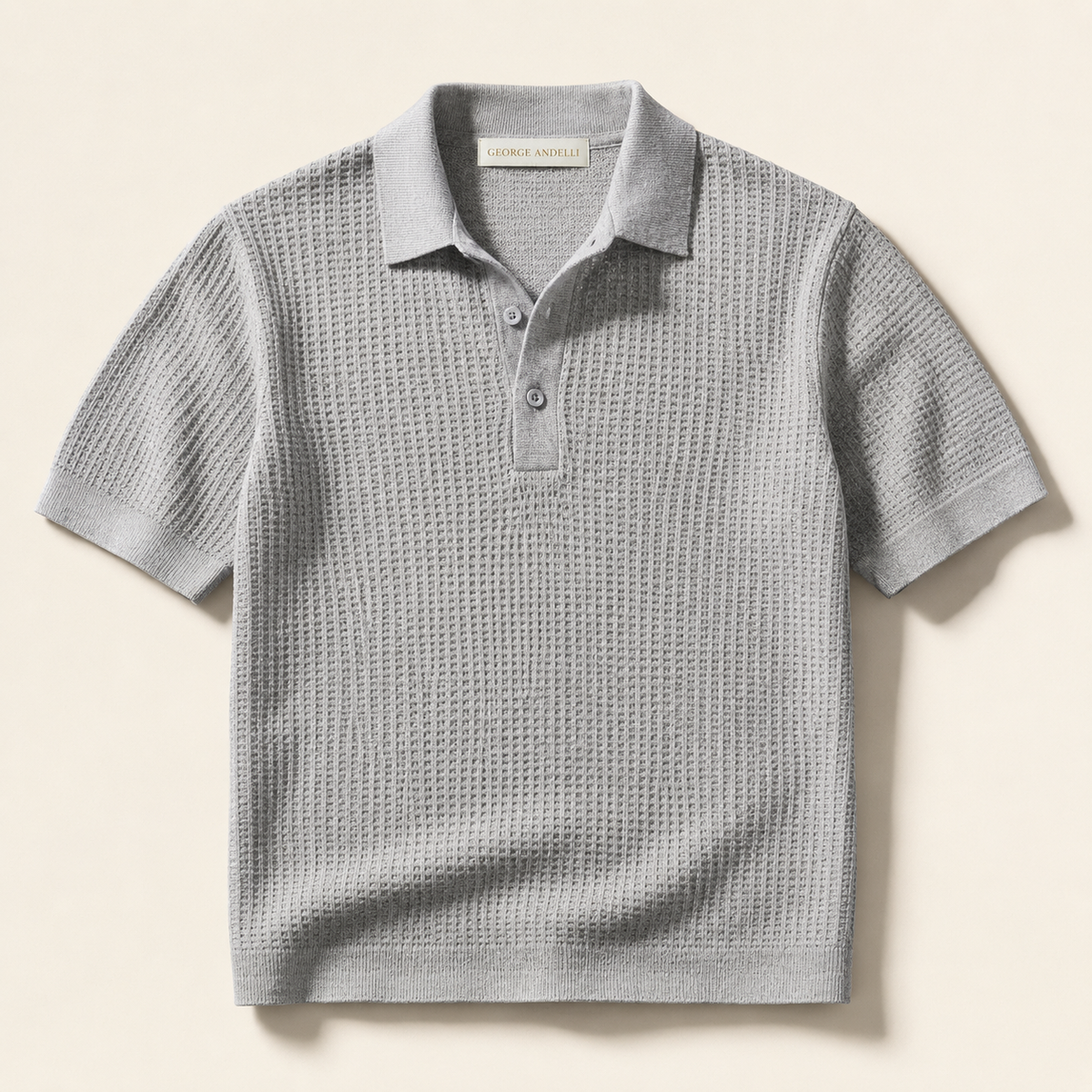 The Belmont Knit Polo — three-quarter view